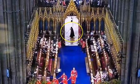Panašu į giltinę – prieš Karolio III karūnavimą buvo pastebėta keista šiurpi figūra juodu apsiaustu (Video)