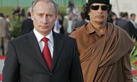 „Revoliucijos lyderis“ ir „Kremliaus šeimininkas“. Kas vienija Kadafį ir Putiną?
