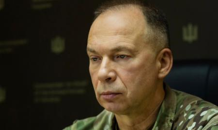 Karių humoras po kulkomis: ką Syrskiui šūktelėjo kovotojai skriejančiame šarvuotyje? (Video)