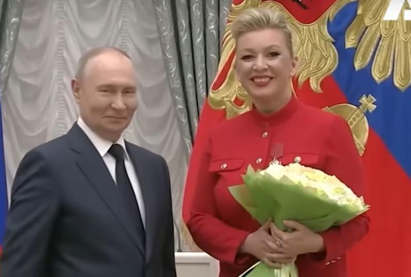 V. Putinas ir M. Zacharova