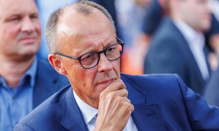 Vokietija stumia Merzą į Putino glėbį. Spaudimas didėja